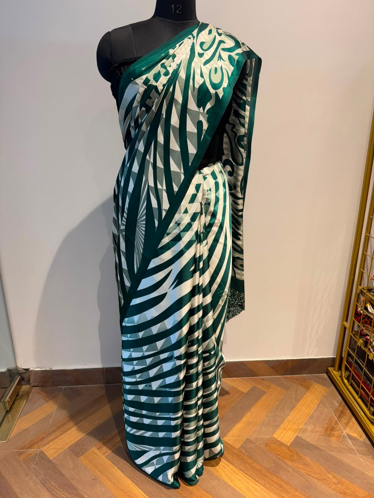Green Bordered Printed Crape Saree