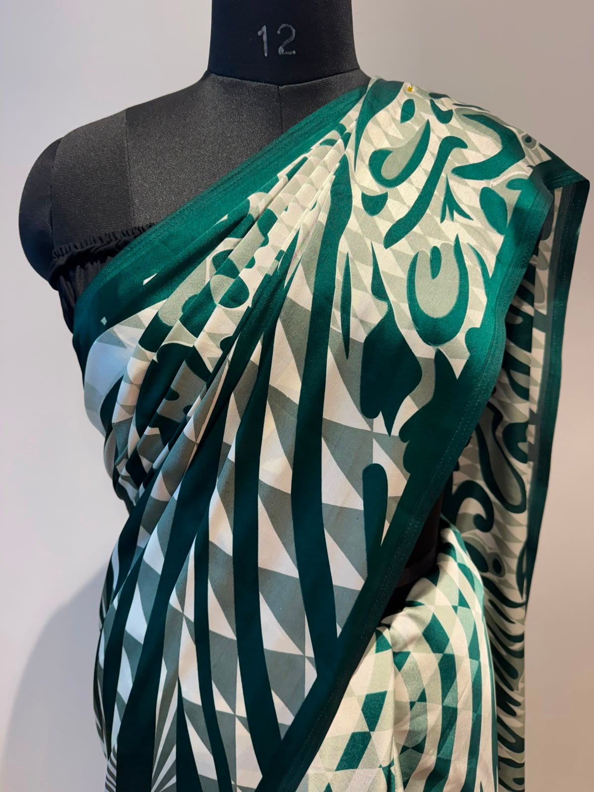 Green Bordered Printed Crape Saree