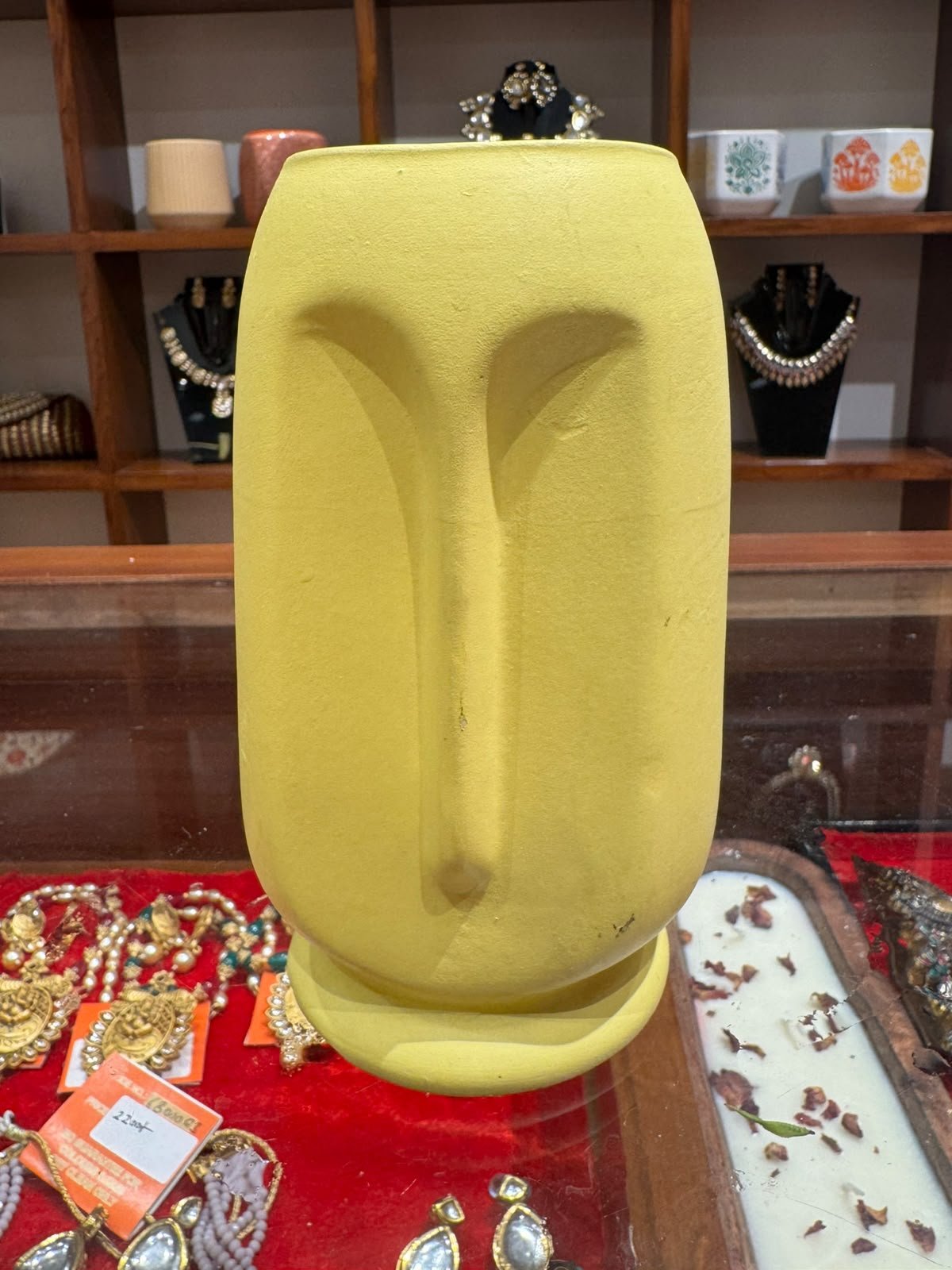 Yellow Sculpted Face Pot